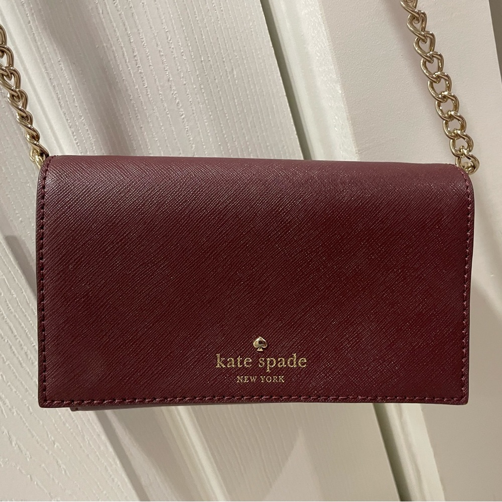 Small burgundy Kate spade crossbody